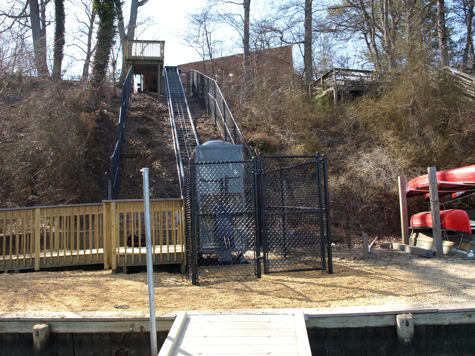 Hill Tram system provides access for wheelchair students to the waters edge at public school outdoor education facility in Maryland