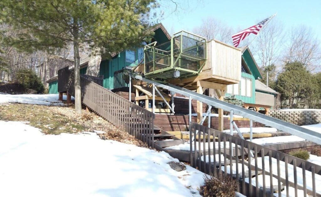 Hill Hiker hill trolley with special cantilever car on lake property in MN