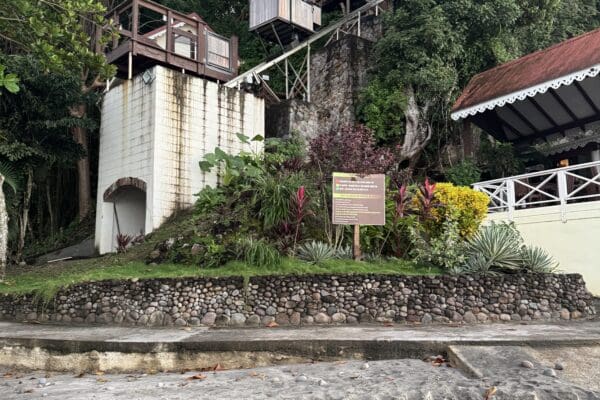 Inclined trolley car lift riding down to beach access at an oceanside resort