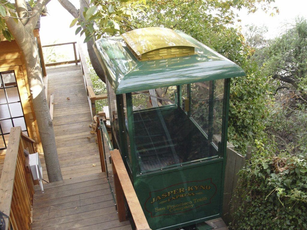 Close up view of custom cable car project featuring the intricate sheet metal roof manufactured by Hill Hiker