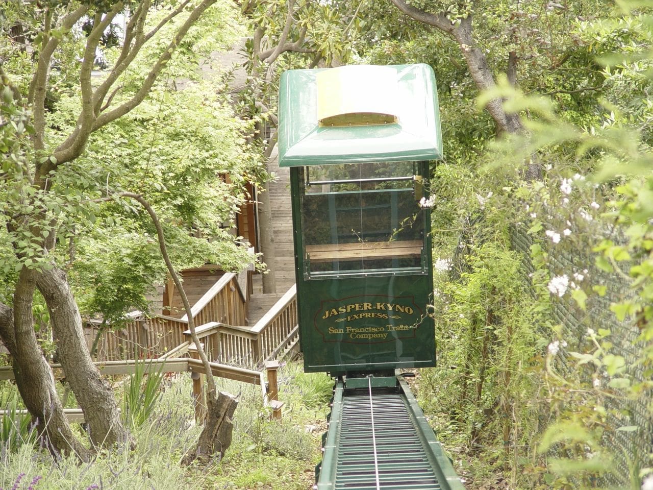 view from above of California custom cable car traveling uphill