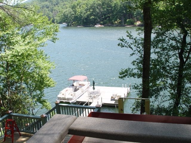 View of reservoir lake and dock from inside funicular lift car in Georgia