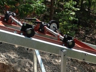 Hill Hiker Incline Elevator chassis in captured rails with knurl safety brakes engaged