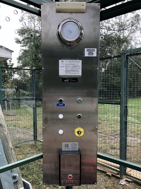 Commercial hillside elevator car controls with emergency phone, alarm bell and light by Hill Hiker