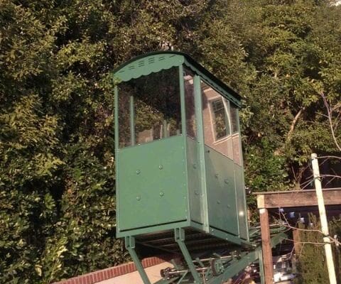 Custom designed fully enclosed hill tram car with sheet metal roof in California