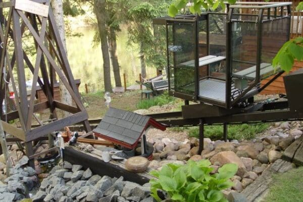 Up north cabin tram lift with fun landscaping and waterfront lake entry