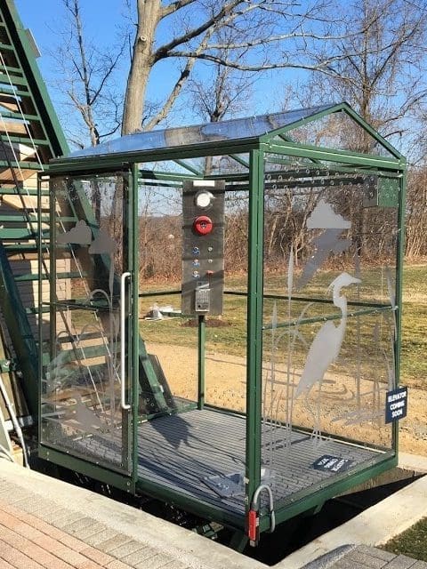 Fully enclosed commercial inclined elevator car at state park by Hill Hiker