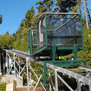 Hill Hiker hillside tram with stainless steel construction, unpainted track rail and powder coat painted car finish