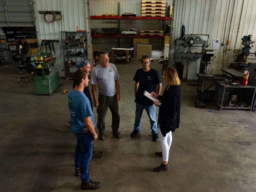 Hill Hiker Shop Team having a production meeting