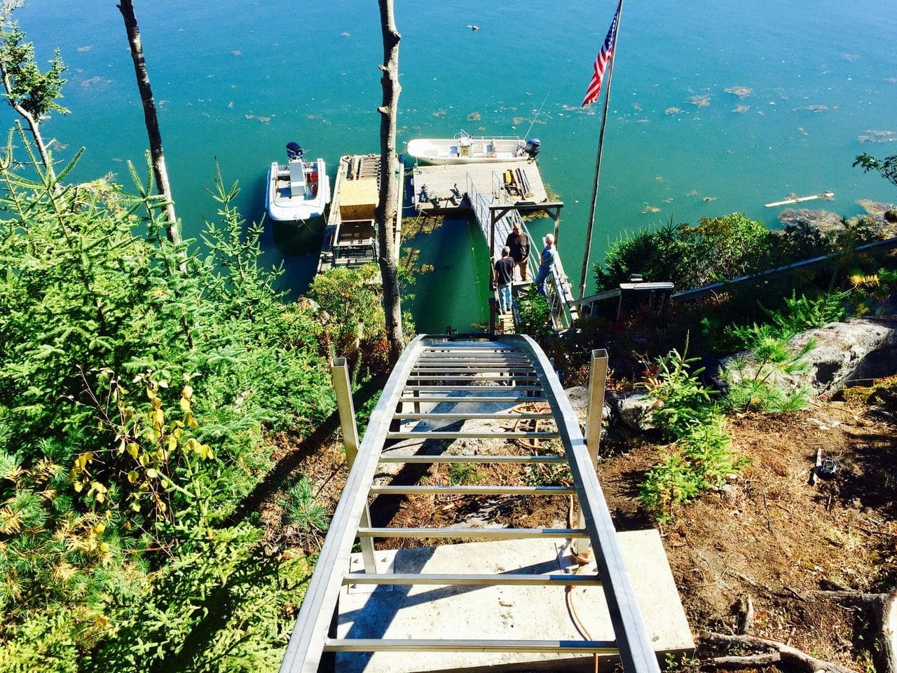 Maine island funicular project with self-leveling track