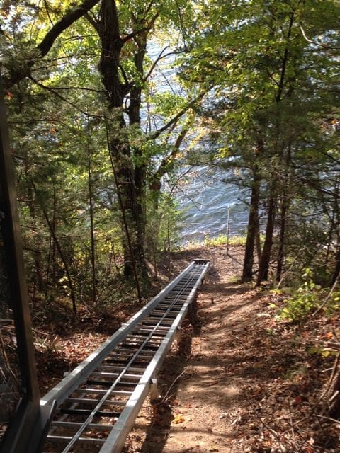 Minnesota Lake Cabin Elevator Tram Through Wooded Hillside to Lake-shore