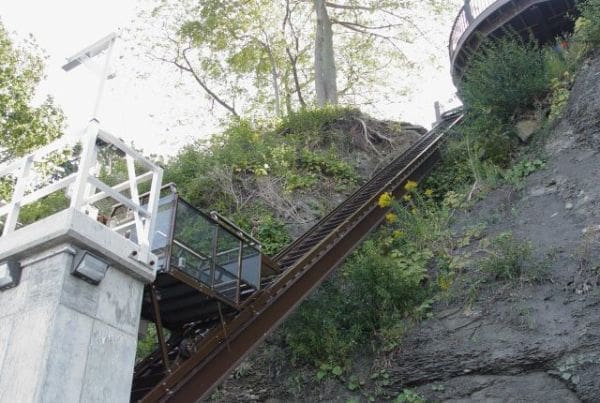 Steel I-Beam supported lakeside lift on steep cliff down to beach of Lake Erie in New York