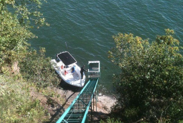 Canada high tide and solar power funicular railway tram system with boat up access