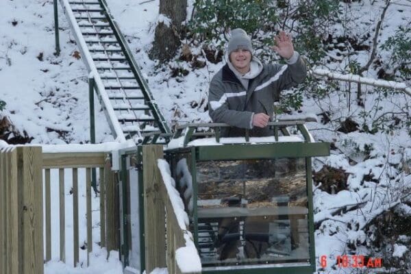 Hill Hiker® Hillside lift operating flawlessly in winter conditions with snow on the ground