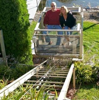 Residential lakeshore lift providing access to the lake